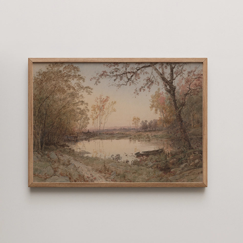 Landscape painting of a serene riverside scene framed in wood, featuring trees in autumn colors and a calm water reflection.
