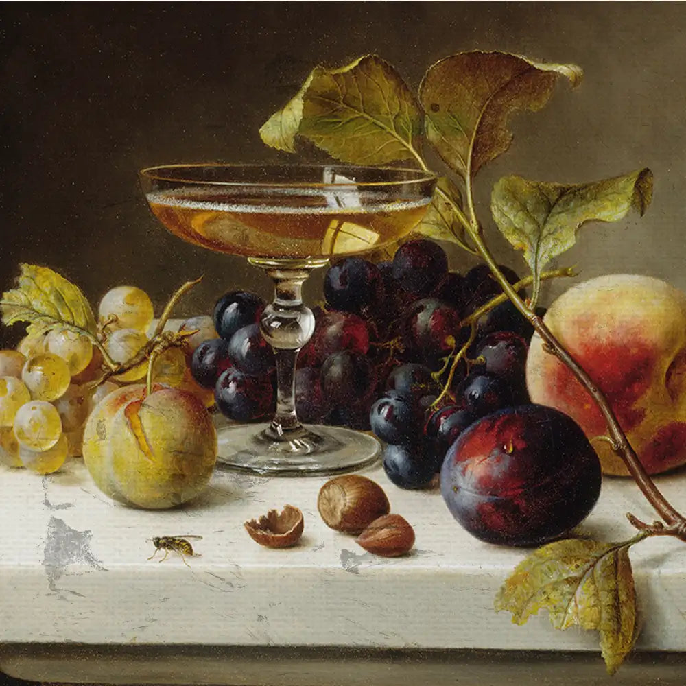Still life painting featuring a glass of amber liquid, assorted fruits including grapes, peaches, and plums, along with leaves and nuts on a light-colored surface.