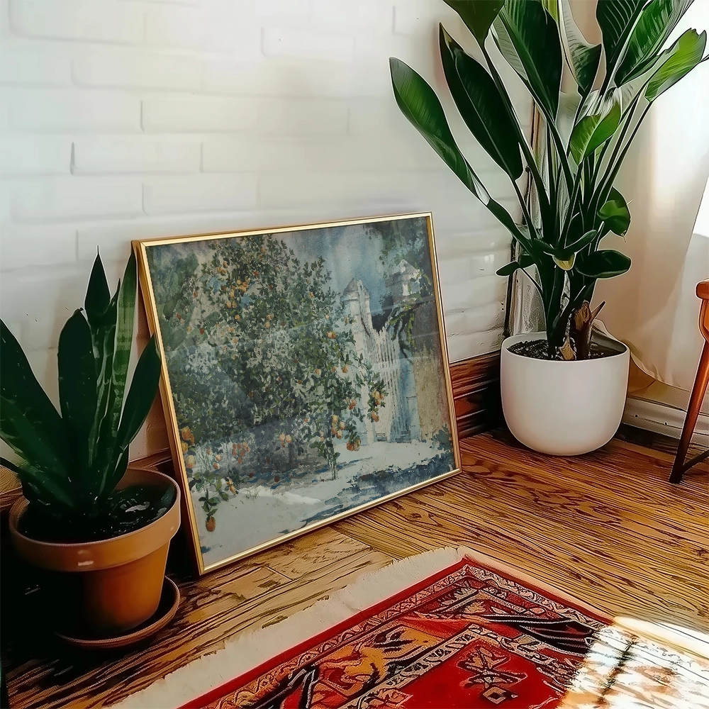 A framed painting of a lush orange tree scene leaning against a wall, surrounded by indoor plants and a decorative rug.