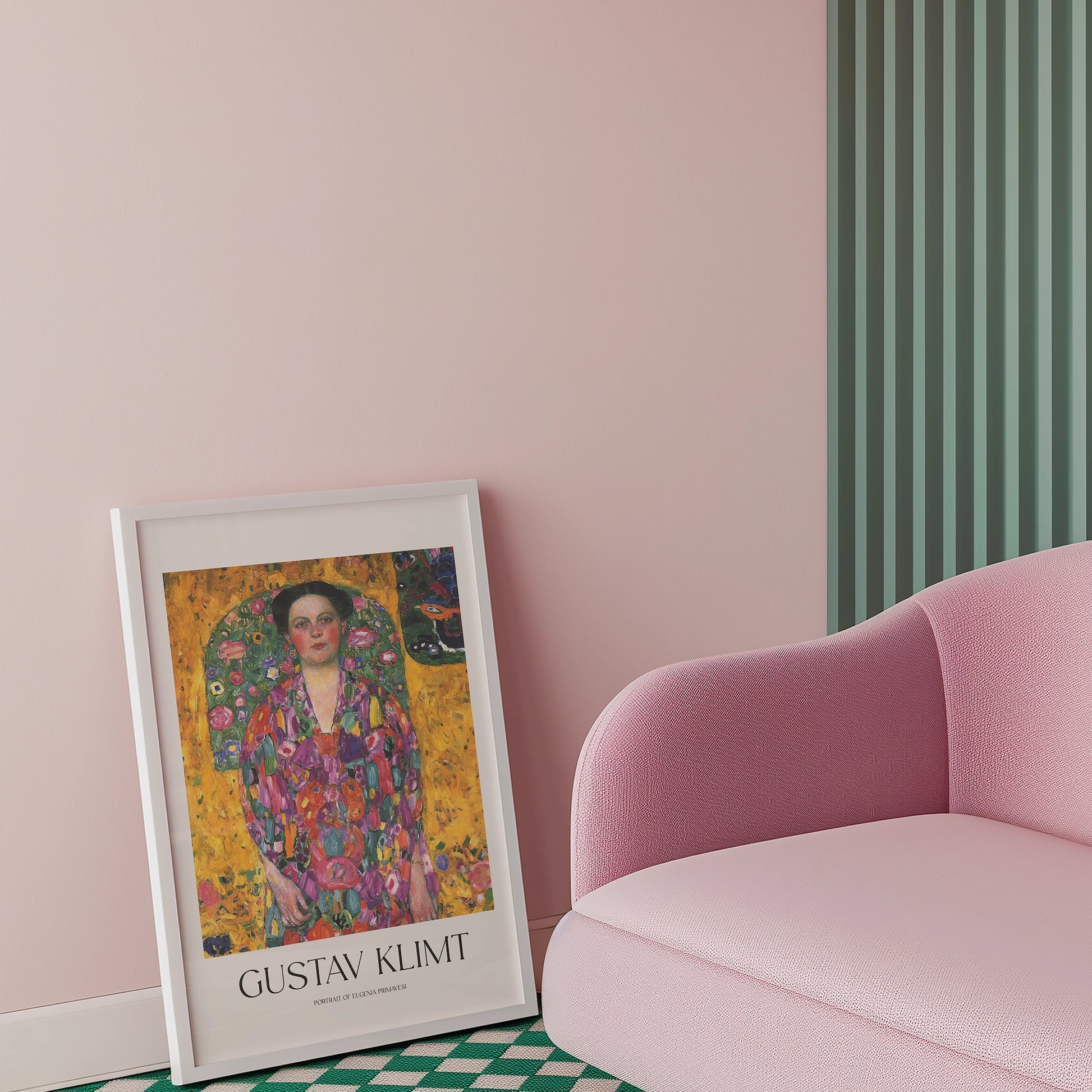 Framed Gustav Klimt painting titled "Portrait of Adele Bloch-Bauer I" leaning against a pink wall next to a modern pink sofa.