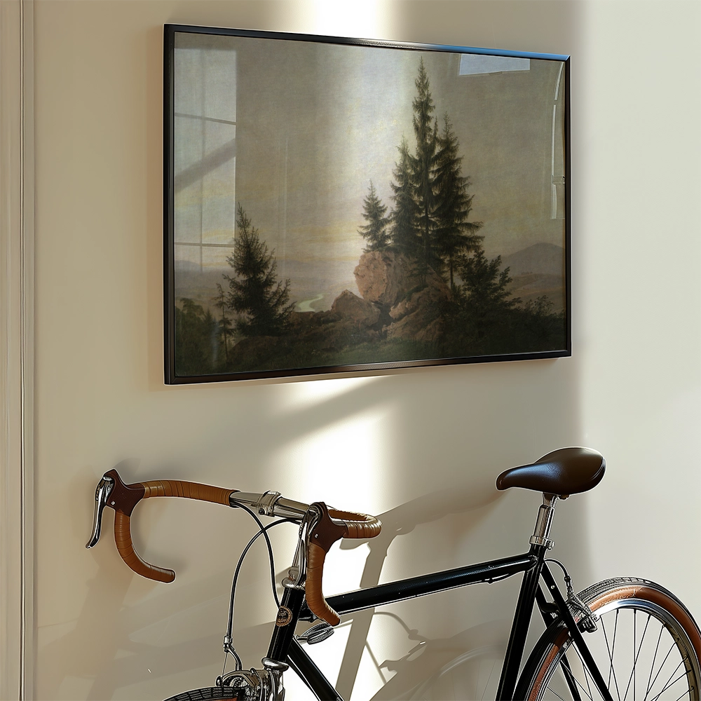 A landscape painting featuring trees and rocks hanging on a wall beside a bicycle with brown leather handlebars.