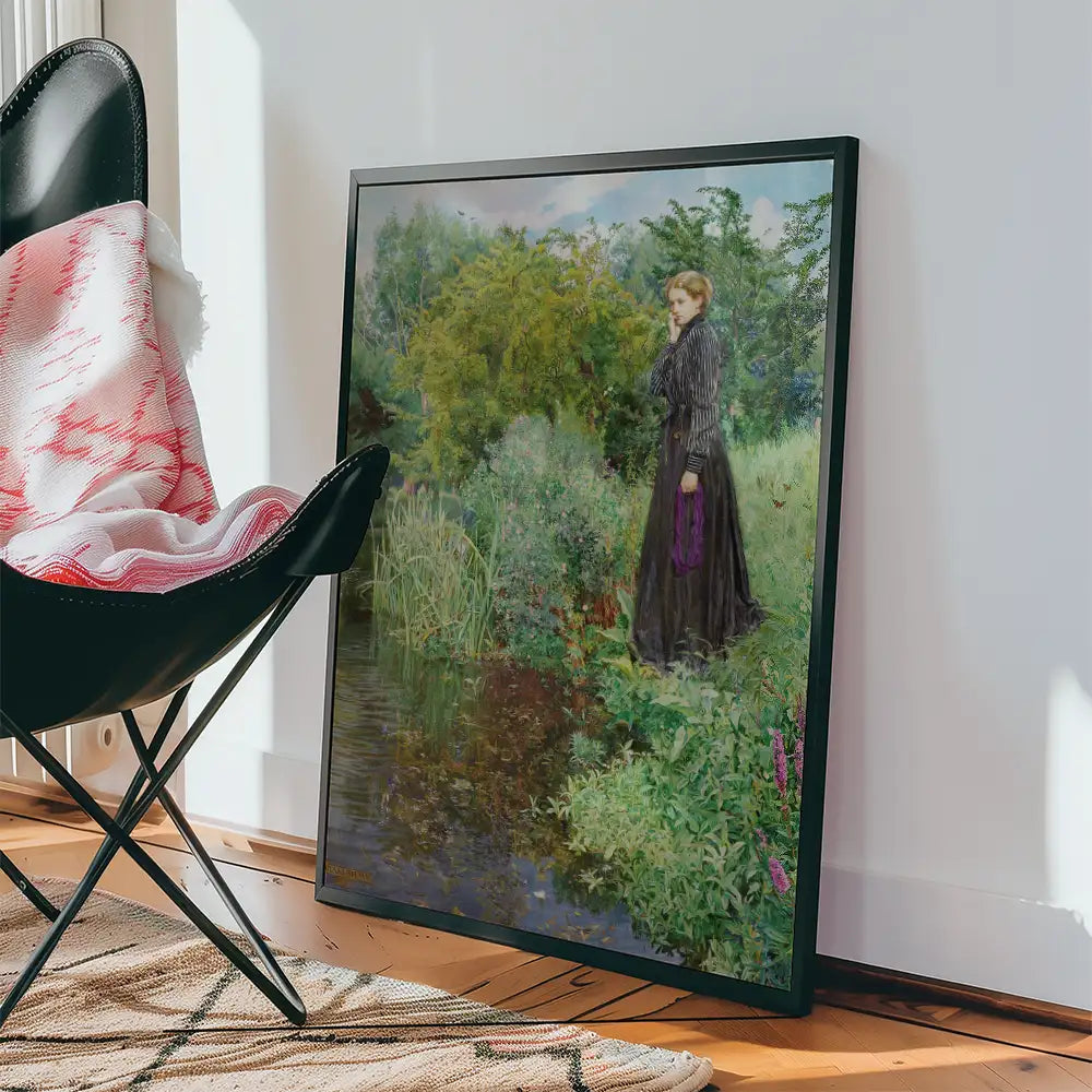 Framed painting of a woman in a black dress standing by a serene pond surrounded by lush greenery.