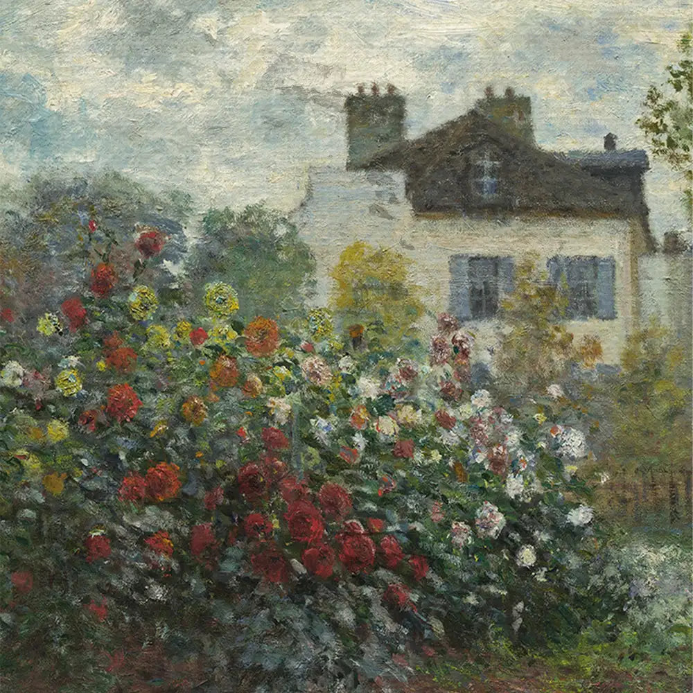 A colorful garden filled with red, yellow, and white flowers in front of a traditional house under a cloudy sky.