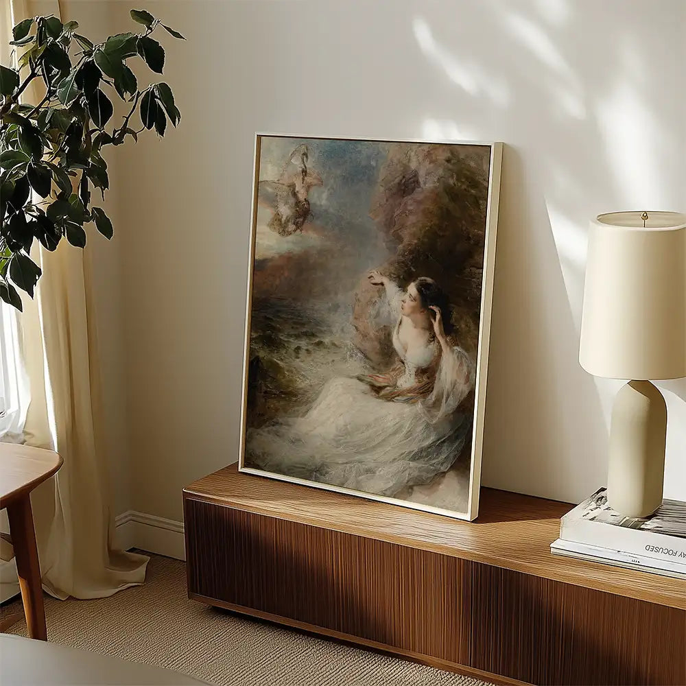 A framed painting of a serene woman in a flowing dress, surrounded by a natural landscape, displayed on a modern wooden console table beside a minimalist lamp and a houseplant.