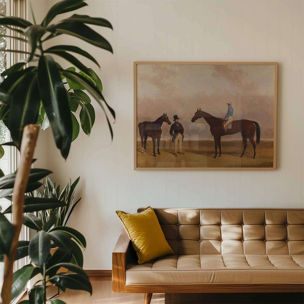 Painting of two horses and riders in a natural setting, framed and displayed above a mid-century modern sofa with a yellow cushion, surrounded by indoor plants.