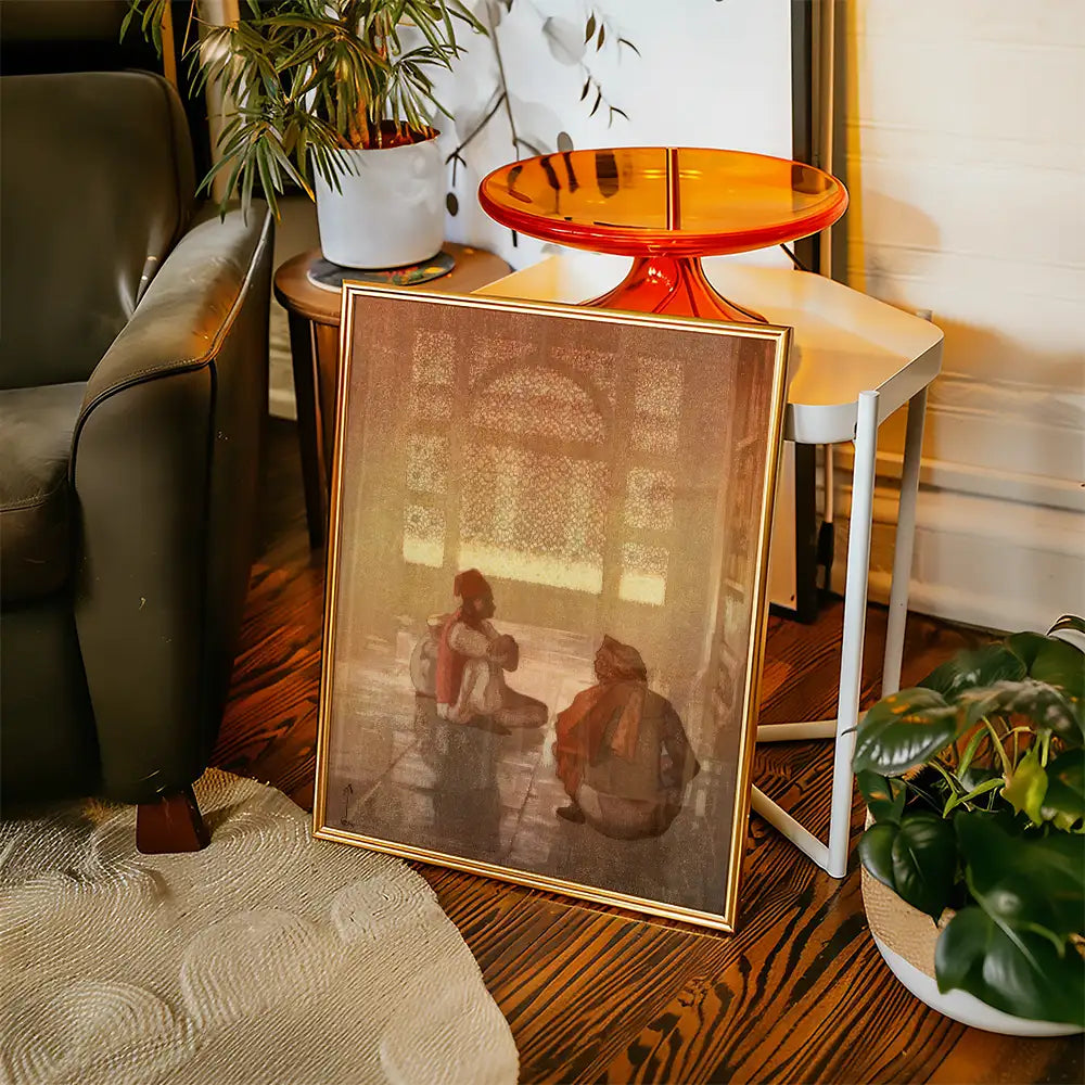 Framed painting depicting two figures in a historical setting, leaning against a wall with intricate architectural details in the background, placed near a modern furniture arrangement.