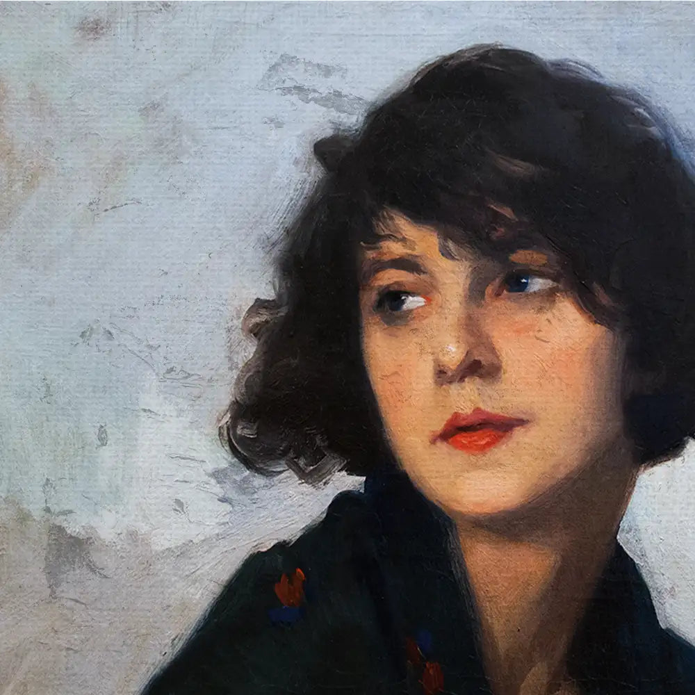 Portrait of a woman with short curly hair and a thoughtful expression, against a light textured background.