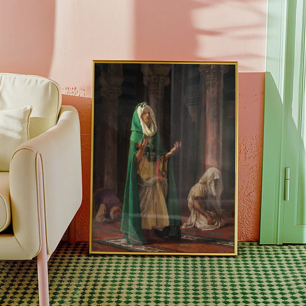 Religious painting featuring a woman in a green cloak praying, with two figures in the background kneeling, displayed in a stylish interior setting.