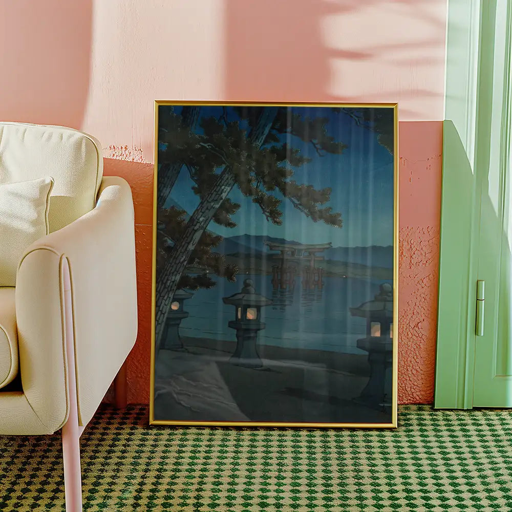 Framed painting of a serene landscape with lanterns and a torii gate, set against a dusk sky, displayed in a modern living room.