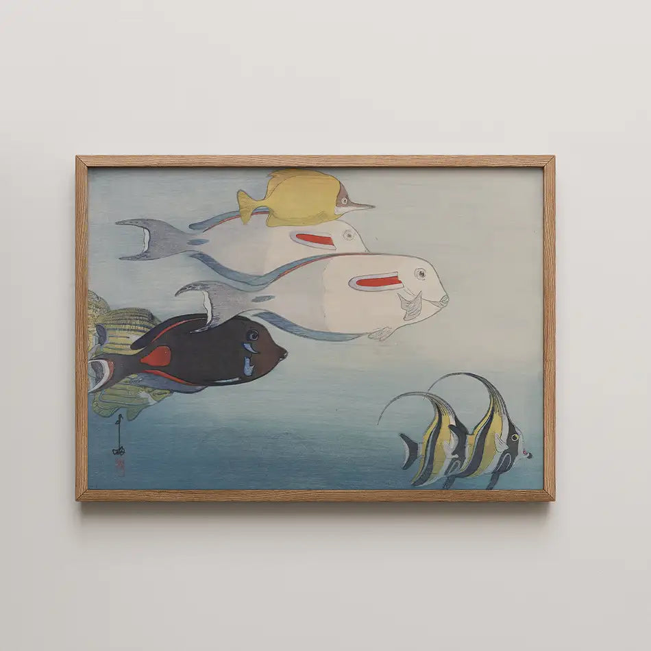 Painting of colorful fish swimming underwater, framed with a wooden border.