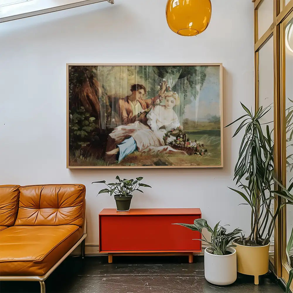 Painting of a man and woman in a serene outdoor setting, framed and displayed in a modern living room with orange couch and green plants.