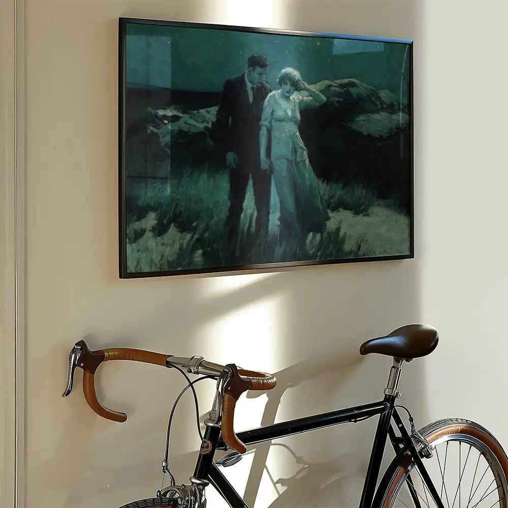 Painting of a couple standing in a grassy field with rocky landscape in the background, framed and hanging on a wall next to a vintage bicycle.