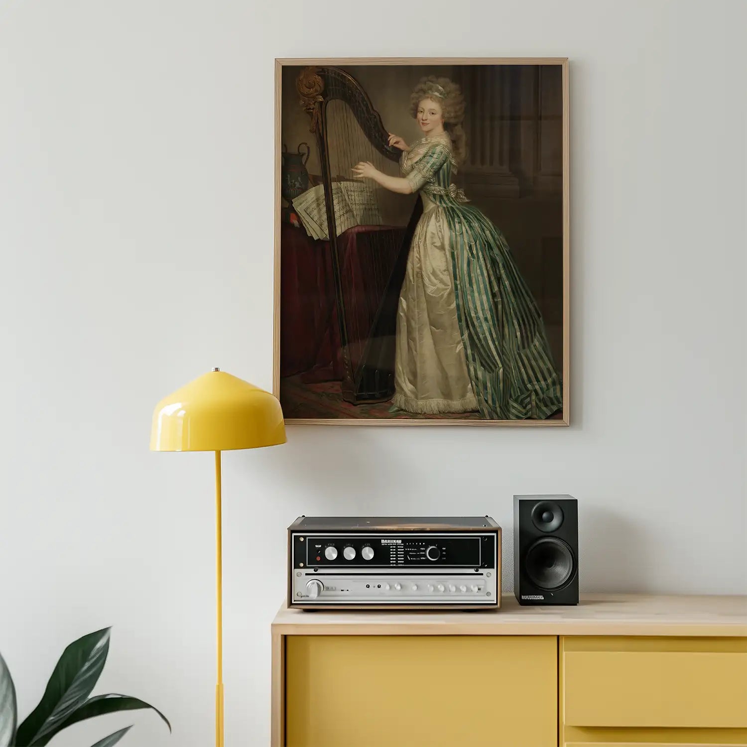 A vintage painting of a woman playing a harp, framed and displayed on a wall above a yellow lamp, a stereo system, and a speaker on a wooden console table.