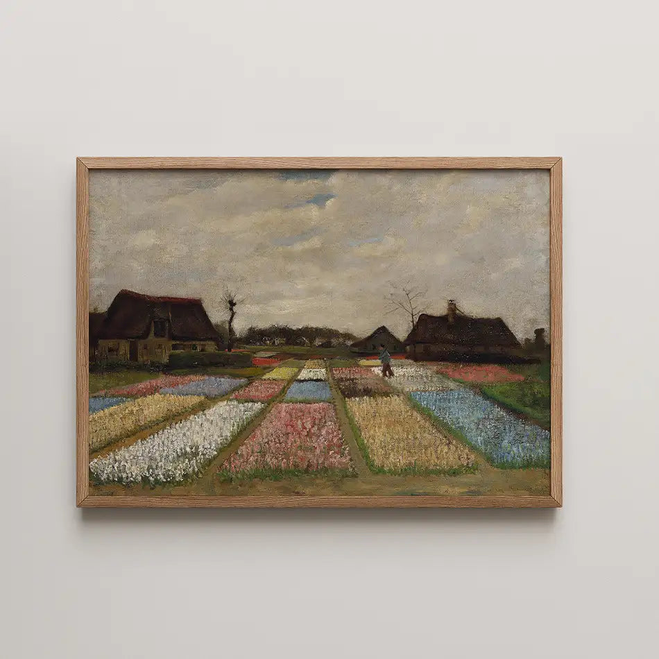 Painting of a landscape featuring colorful flower fields with a cloudy sky, framed in wood.