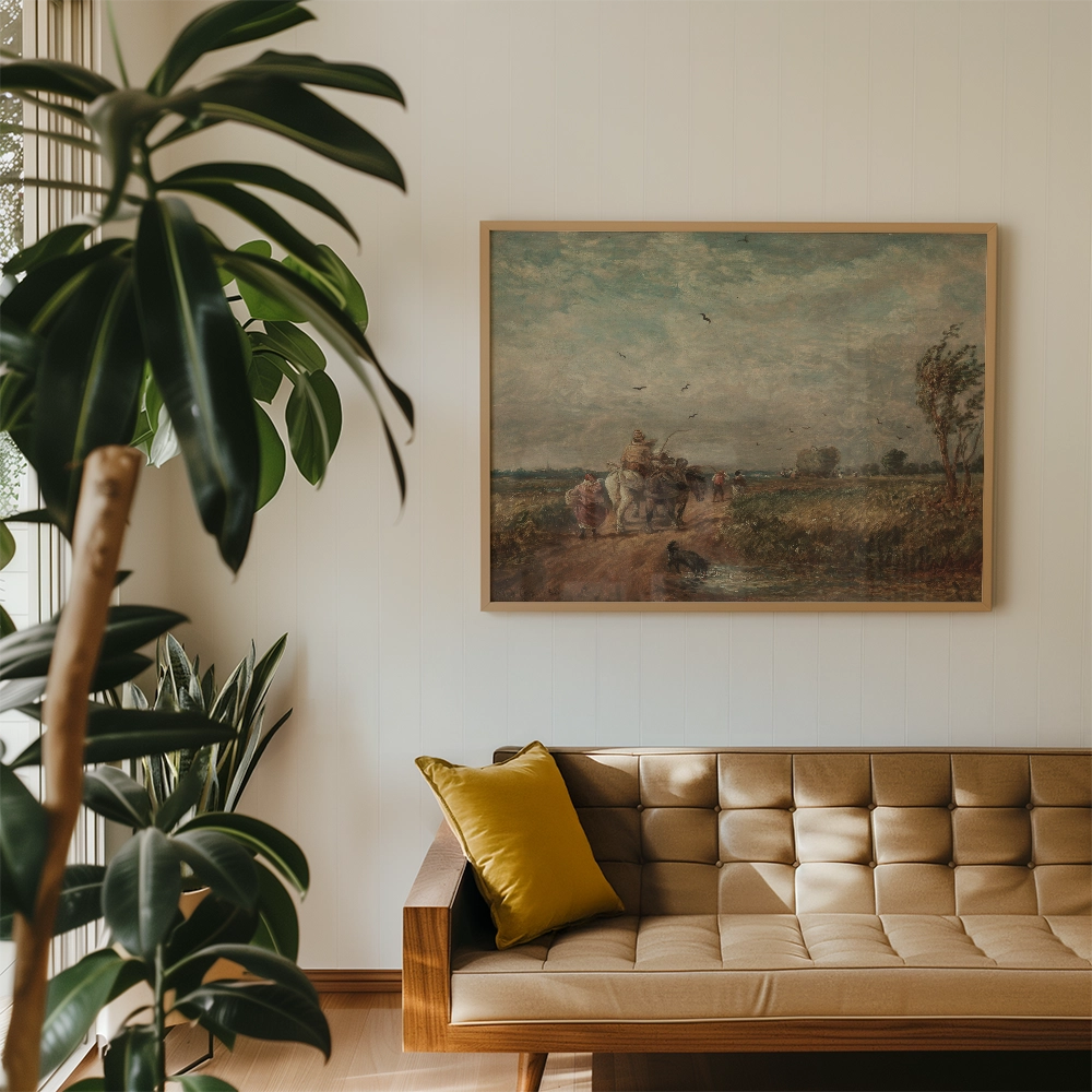 A vintage painting of a rural scene with figures and a horse on a path, framed and displayed on a wall above a modern beige sofa with a yellow pillow in a stylish interior setting.