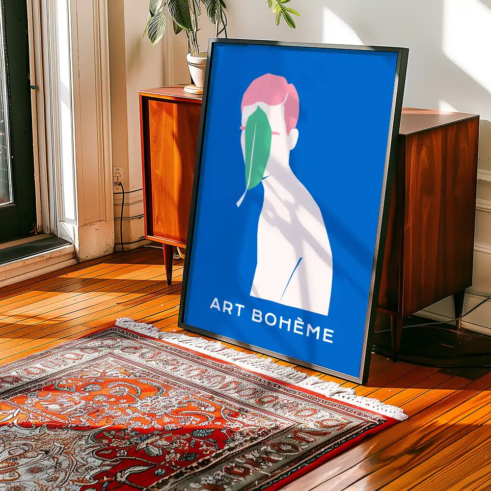Modern poster featuring a minimalist design of a figure with a leaf, titled "Art Bohème," framed and displayed in a stylish interior setting.