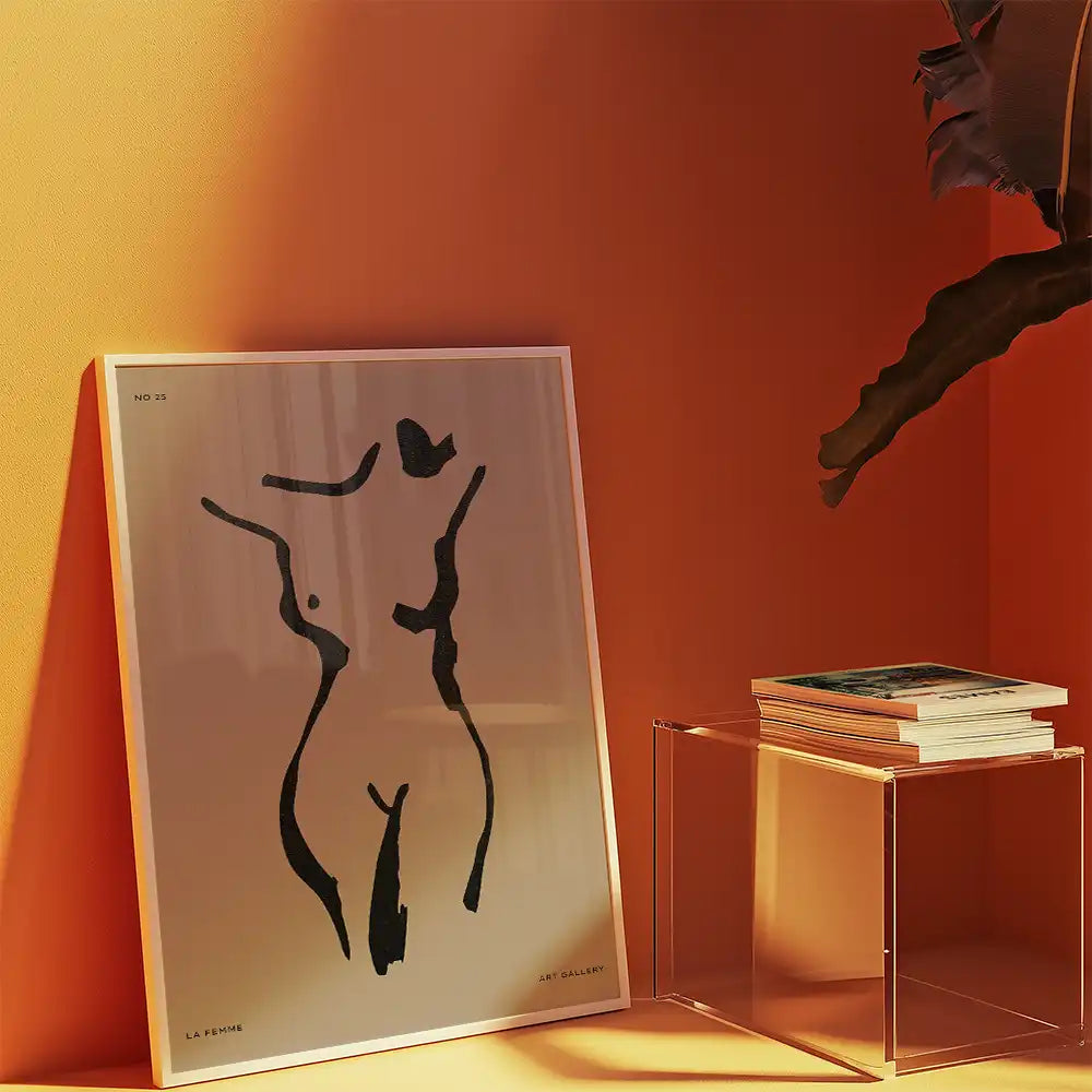 Modern reprint of a famous abstract painting featuring a female form, displayed in a contemporary setting with warm orange tones.
