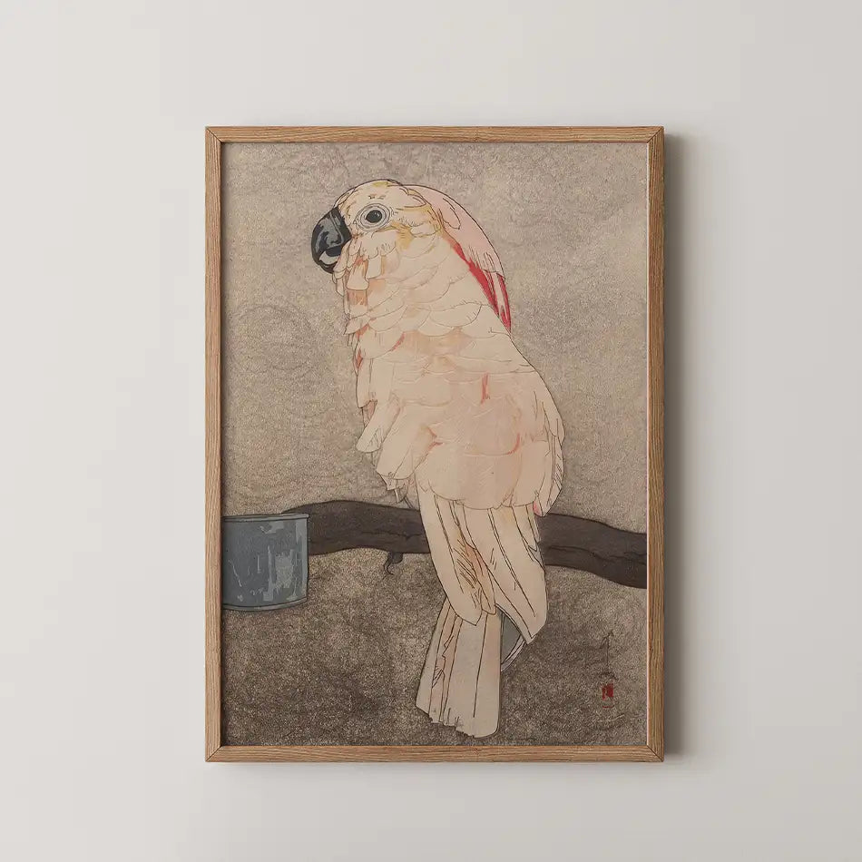 Framed painting of a white parrot perched on a branch with a textured gray background.