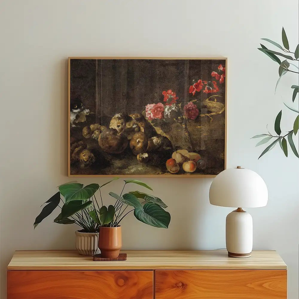 Still life painting featuring flowers, fruits, and a bowl on a dark background, displayed above a wooden sideboard with a plant and lamp.