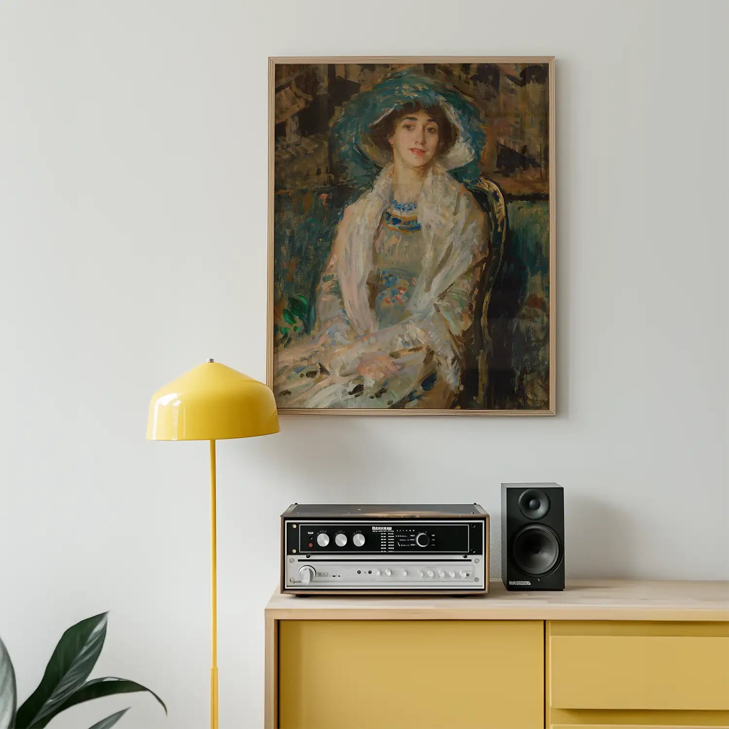 Painting of a woman in a hat displayed above a retro-style record player and speakers beside a yellow floor lamp in a modern interior setting.