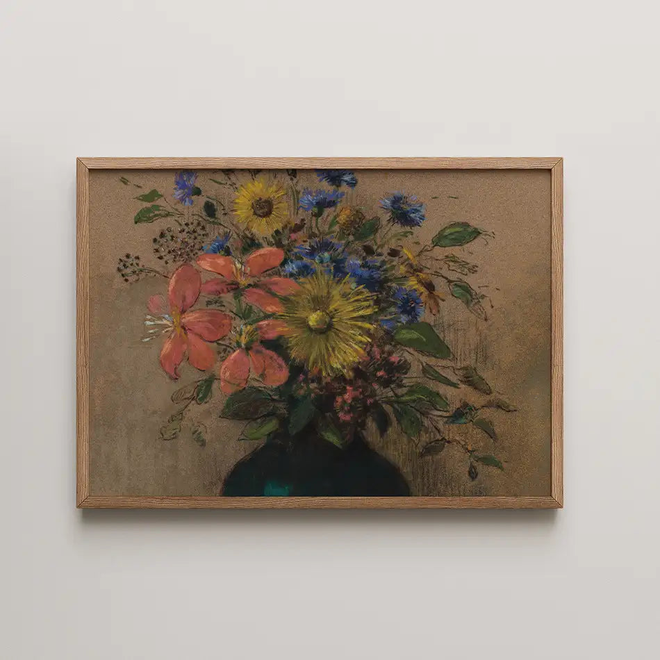 A vibrant floral painting featuring a bouquet of pink, yellow, and blue flowers in a dark vase, framed in natural wood.
