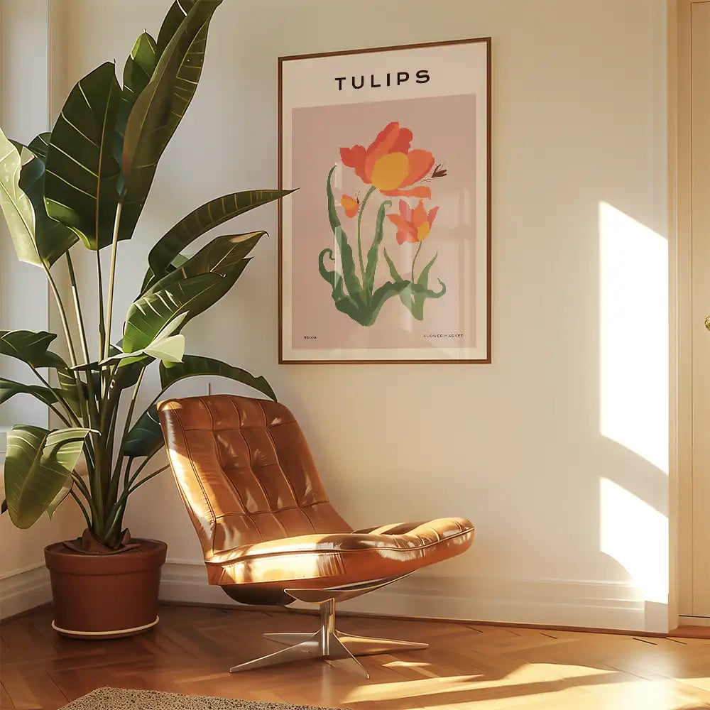 Modern poster of tulips in vibrant colors, featuring a minimalist design, framed and displayed in a stylish interior setting with a brown lounge chair and indoor plant.