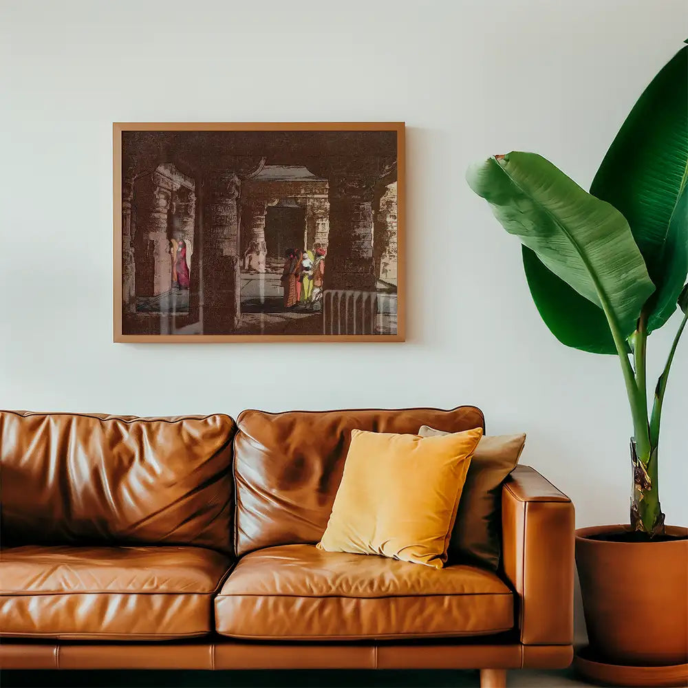 Framed painting of a historical scene featuring figures in traditional attire, displayed above a brown leather couch in a modern living room setting.