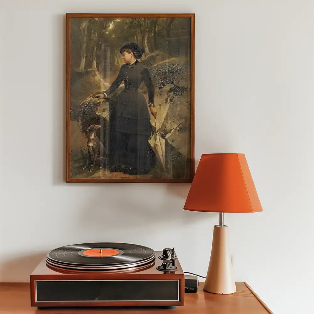 Painting of a woman in a black dress holding an umbrella, accompanied by a dog, displayed above a vintage record player with an orange lamp beside it.