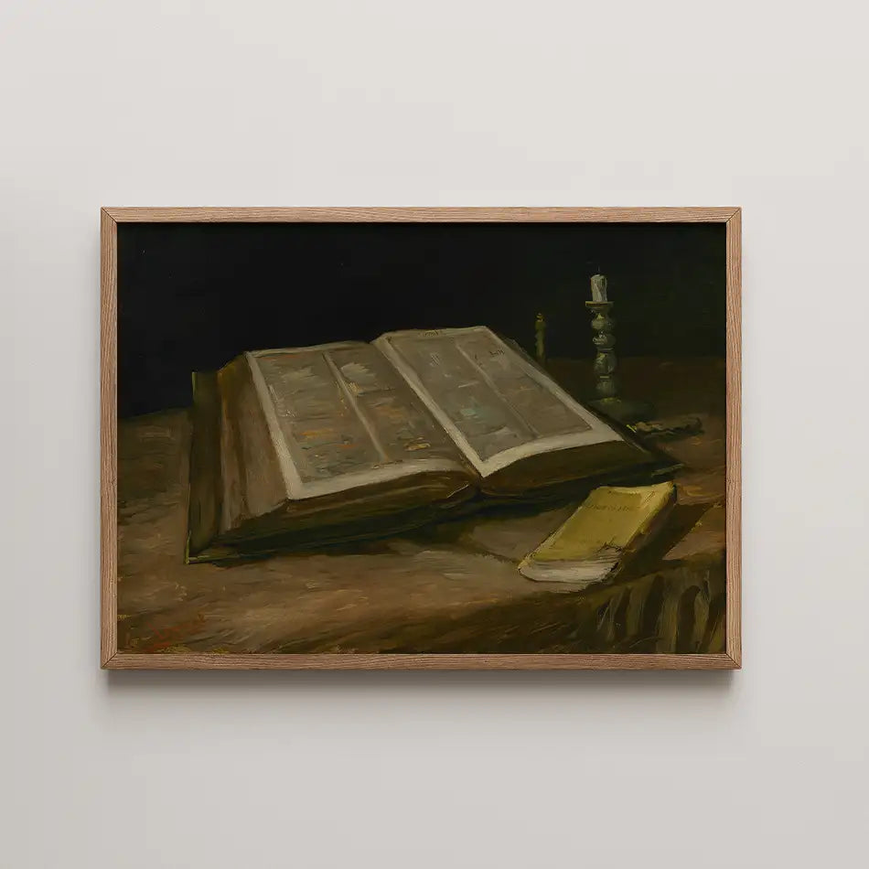 A still life painting of an open book, a closed book, and a candleholder on a dark table background, framed in light wood.