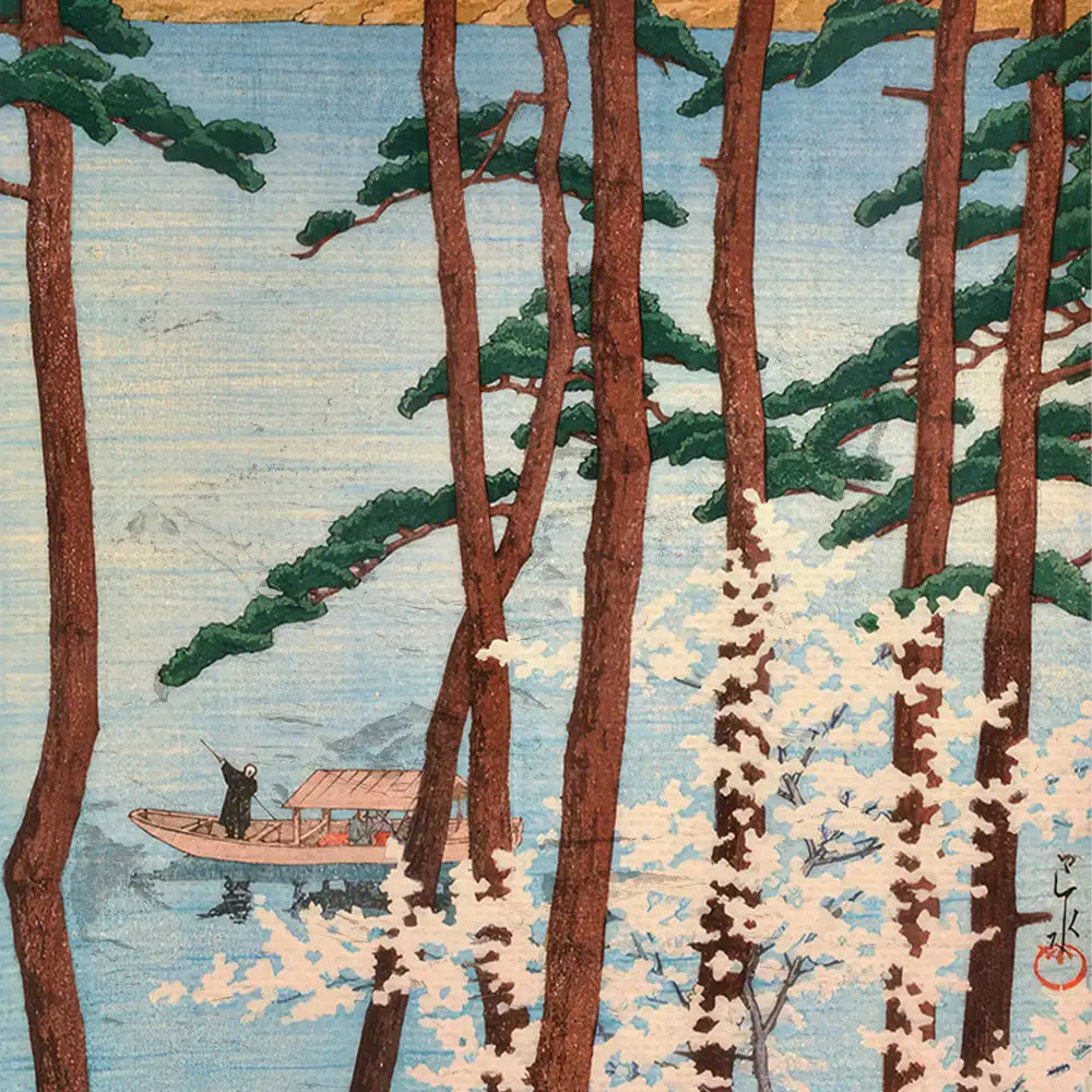 Japanese woodblock print featuring a fisherman in a boat surrounded by tall trees and cherry blossoms on a tranquil blue background.
