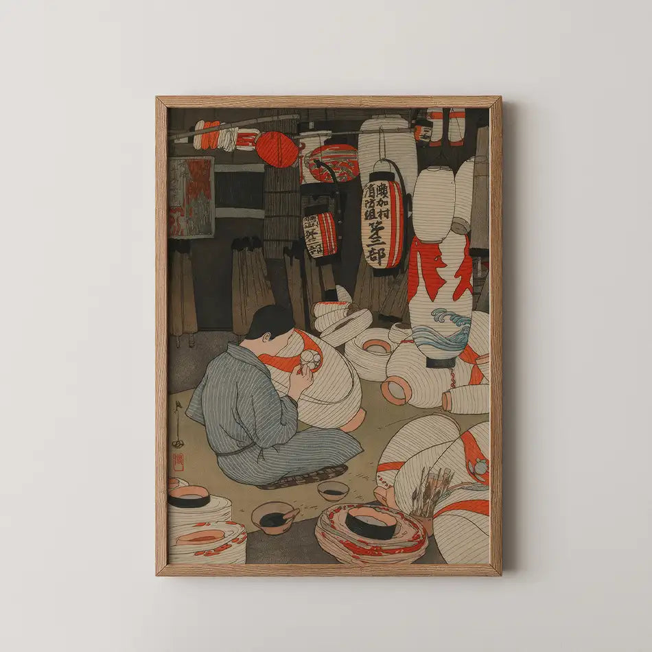 Painting of a person creating lanterns in a traditional workshop, surrounded by various colorful lanterns and artistic tools, framed in wood.
