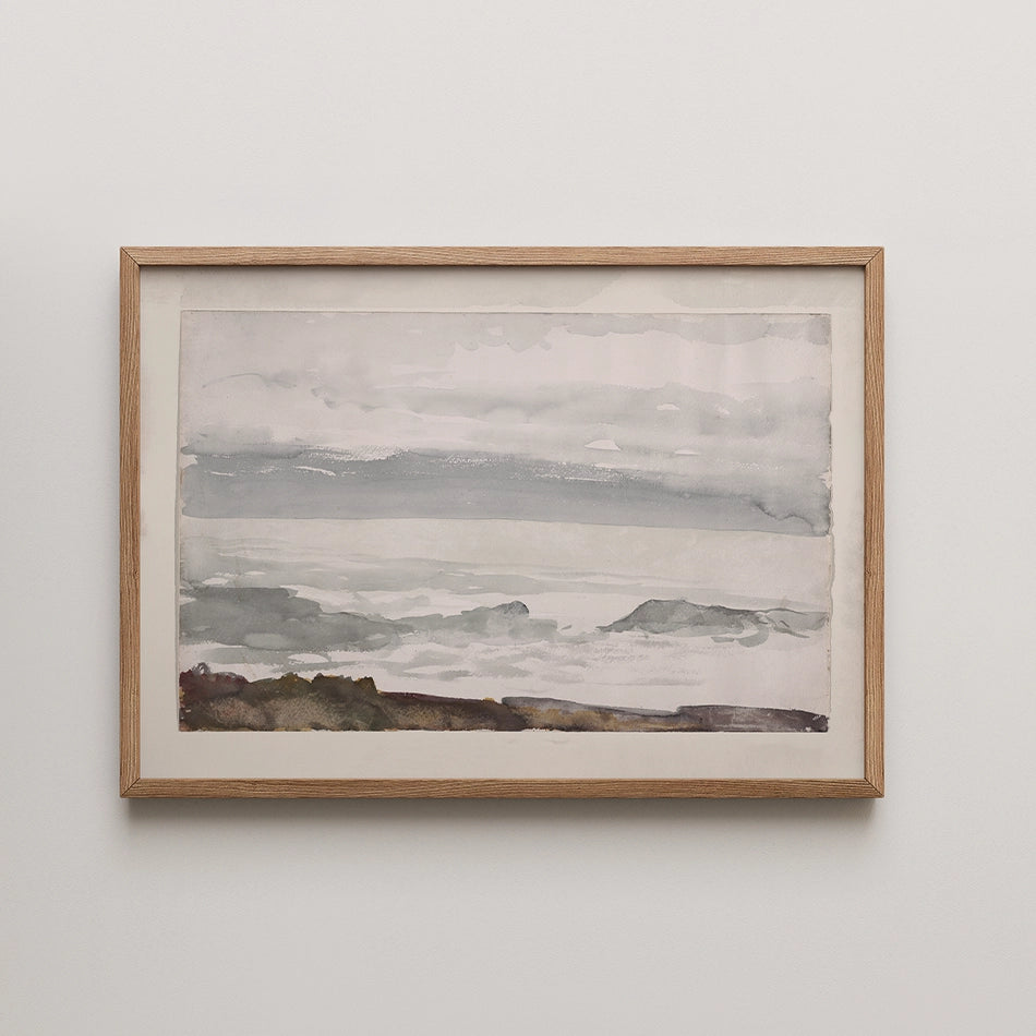 Framed watercolor painting of a tranquil coastal landscape with soft gray and blue hues.