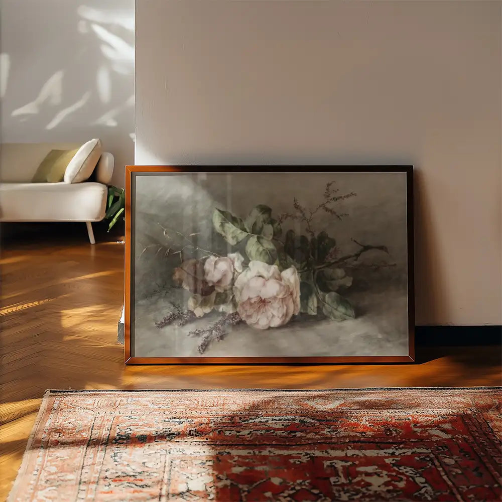 Framed painting of pink flowers and green leaves in a sunlit room with wooden floor and vintage rug.