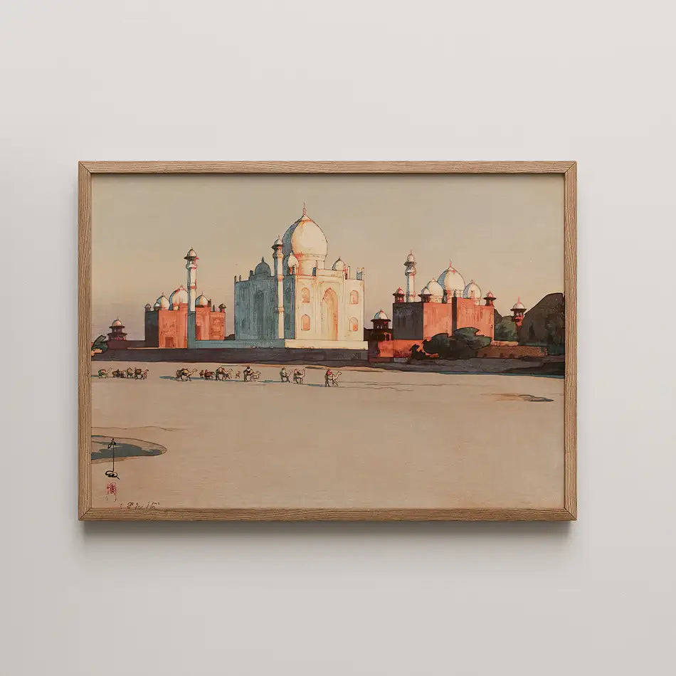 Framed painting of the Taj Mahal at sunset with silhouetted figures in the foreground.