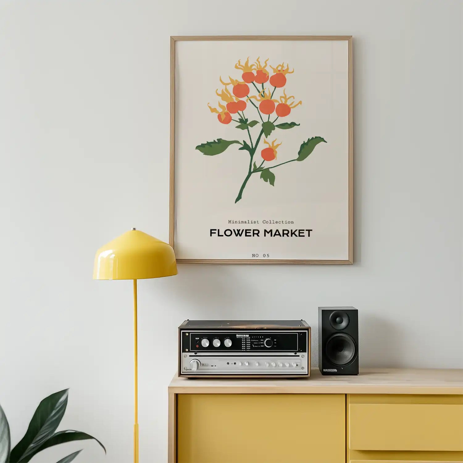 Modern minimalist poster of a flower market featuring vibrant orange flowers and green leaves, framed and displayed in a stylish interior setting with a yellow lamp and retro sound system.