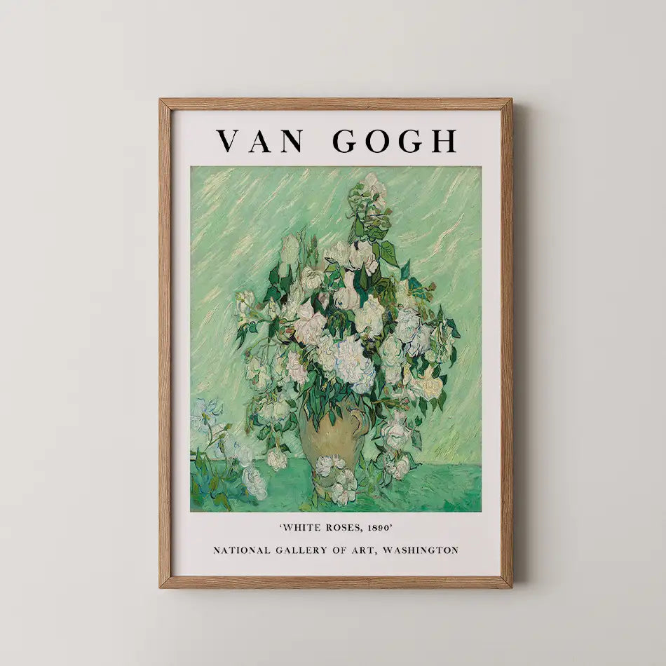 Van Gogh painting poster titled "White Roses, 1890," featuring a bouquet of white roses in a vase against a green background, framed in a wooden frame.