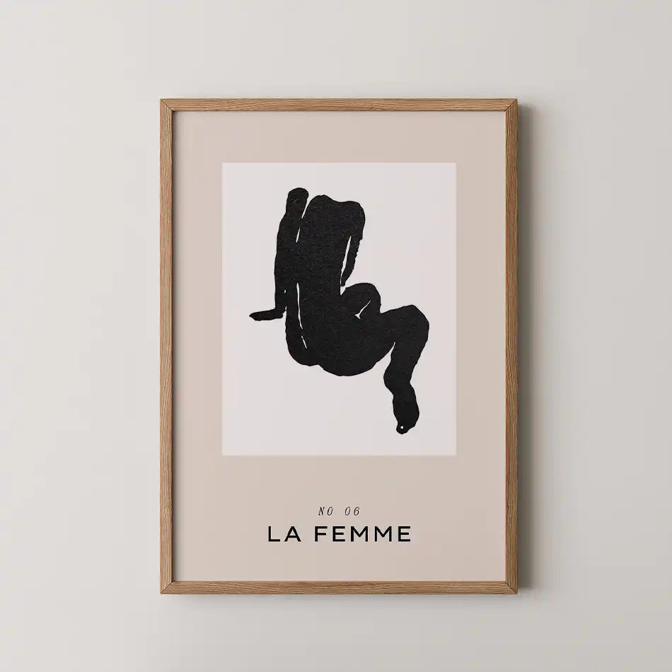 La Femme art print featuring a bold abstract silhouette of a seated female figure in black on a neutral background, from the Modern Art Collection"