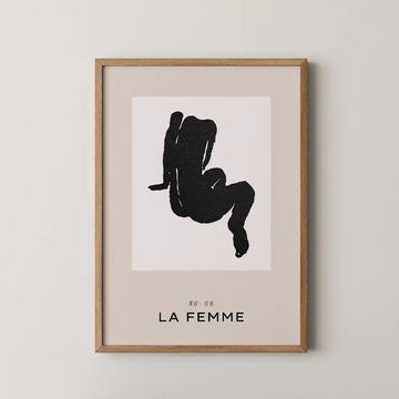 La Femme art print featuring a bold abstract silhouette of a seated female figure in black on a neutral background, from the Modern Art Collection"