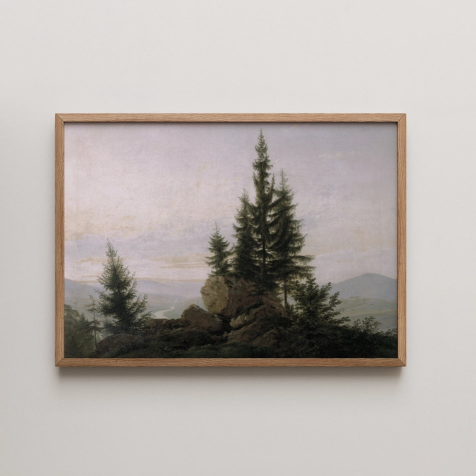 Framed landscape painting featuring a rocky outcrop with pine trees under a soft pastel sky.