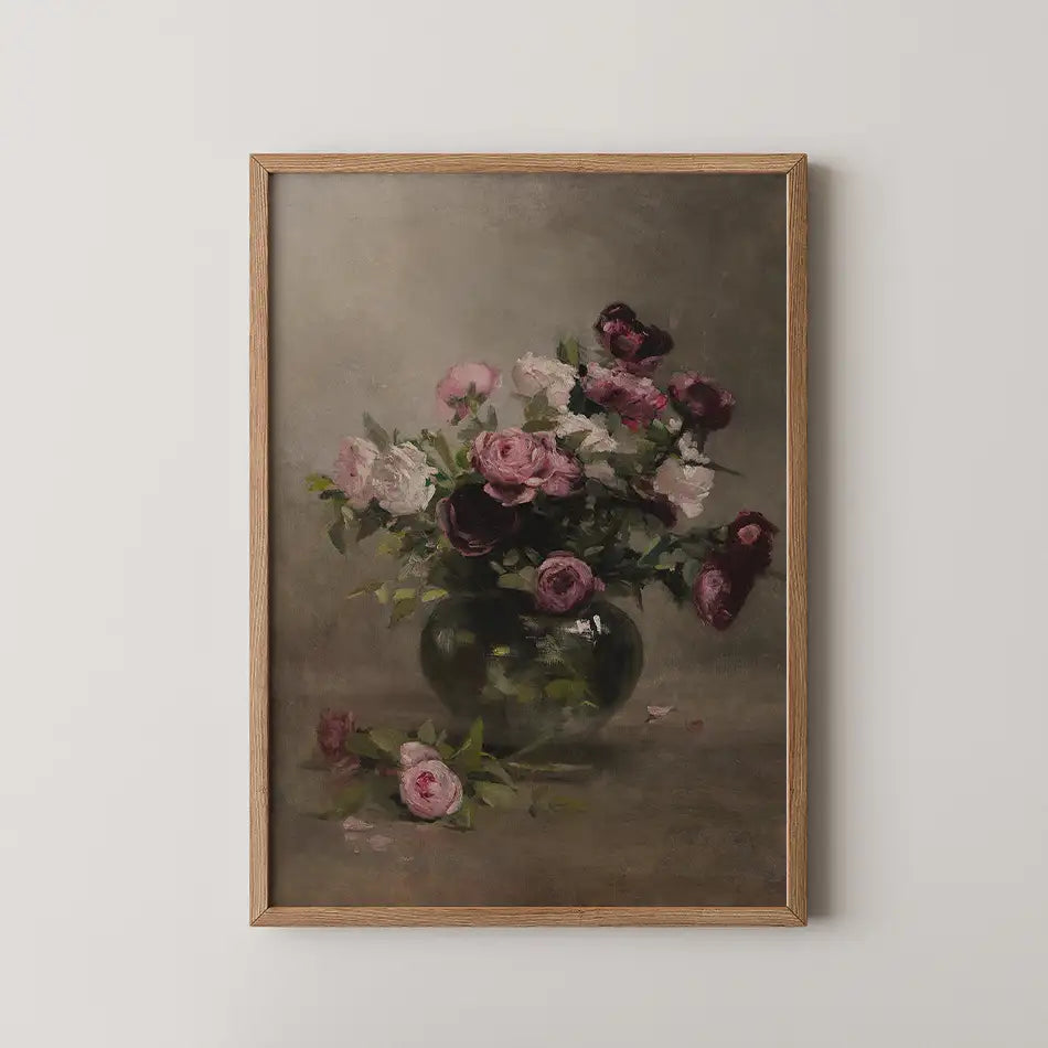 A classic floral painting featuring a bouquet of pink and purple roses in a glass vase, framed in natural wood.