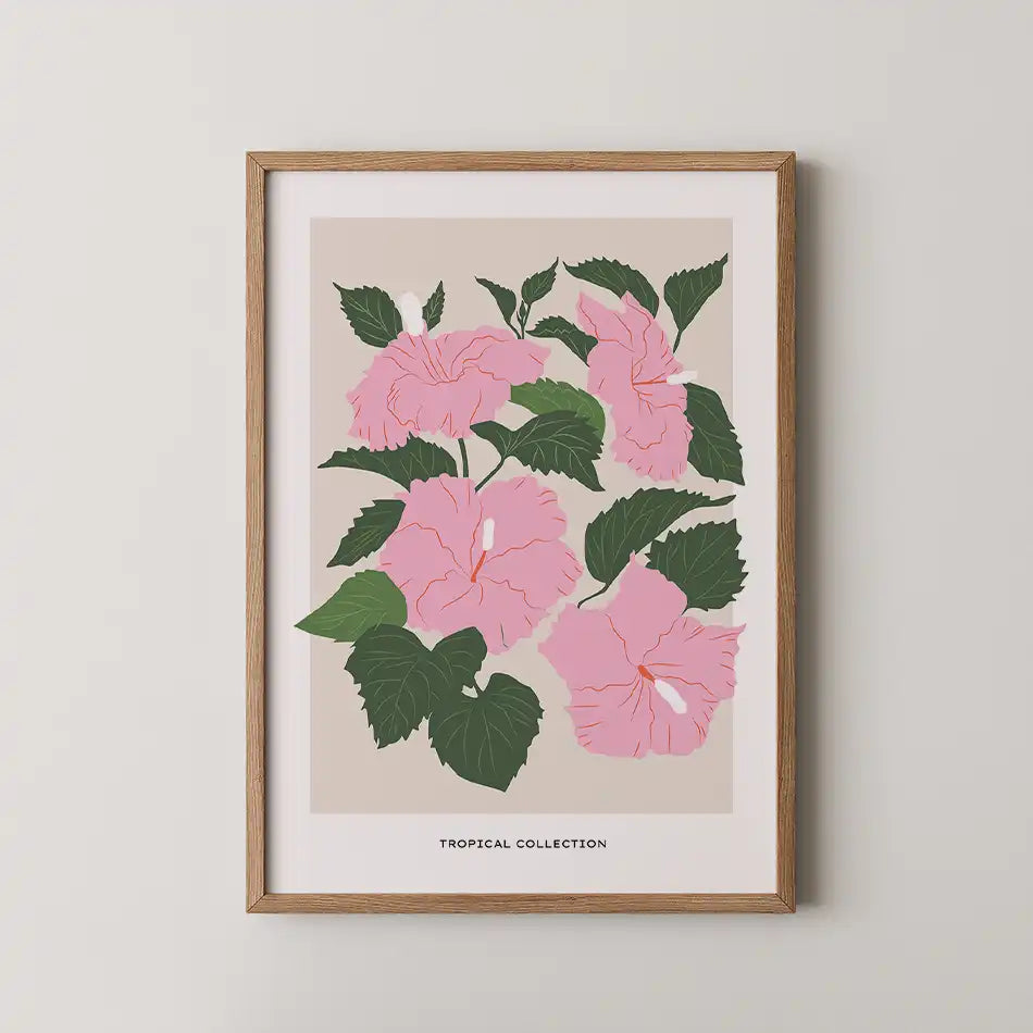 Modern pink hibiscus floral art print from the Tropical Collection, featuring vibrant blooms and lush green leaves on a soft beige background, elegantly framed.