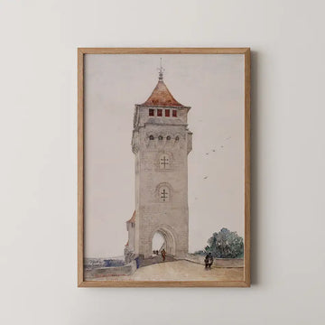 Watercolor painting of a tall stone tower with a red roof, framed in a wooden frame, displayed on a white wall.