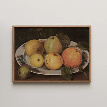 Still life painting of various fruits, including apples and pears, arranged on a floral plate in a wooden frame.