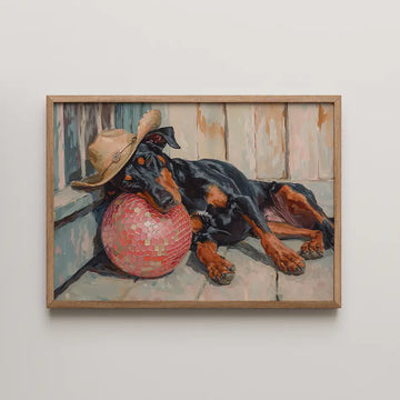Modern art print of a relaxed Doberman wearing a straw cowboy hat, resting on a vibrant pink ball, featuring expressive brushstrokes and a charming cozy atmosphere.