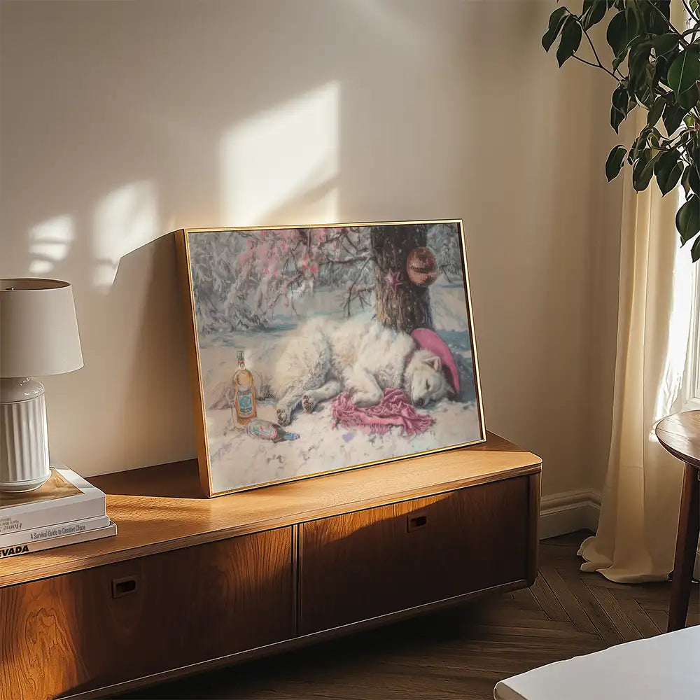 Modern reprint of a famous painting featuring a sleeping white dog with a pink hat in a snowy landscape, adorned with a tree and Christmas decorations, displayed elegantly on wooden furniture.