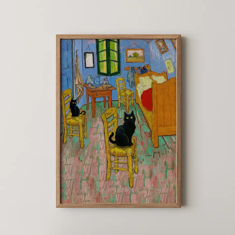 Framed painting of two black cats sitting on yellow chairs in a colorful interior room with a bed and table.