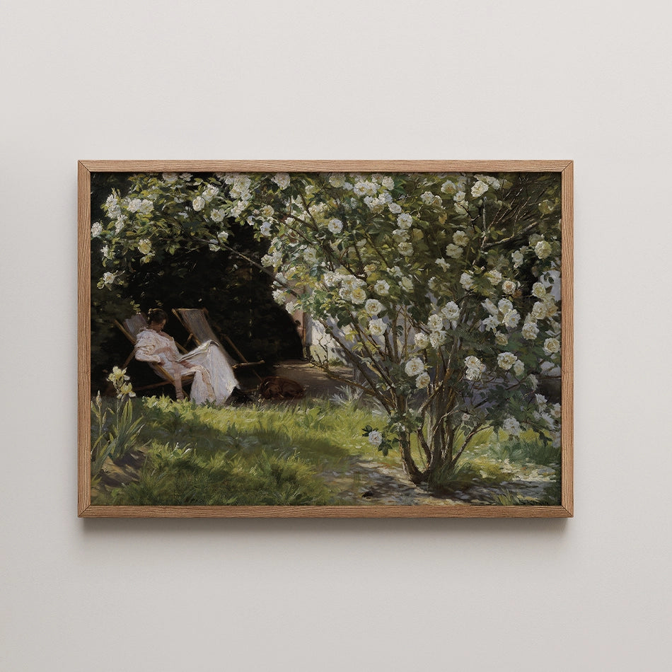 A serene painting depicting a woman reading in a garden, surrounded by blooming flowers and greenery, framed in light wood.