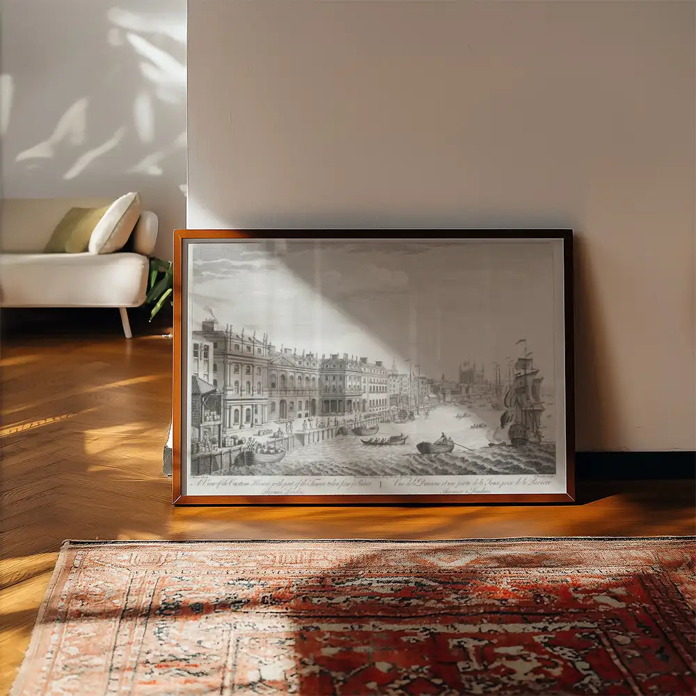 Framed vintage-style painting of a waterfront scene with boats and buildings, leaning against a wall in a well-lit room with wooden flooring and a decorative rug.
