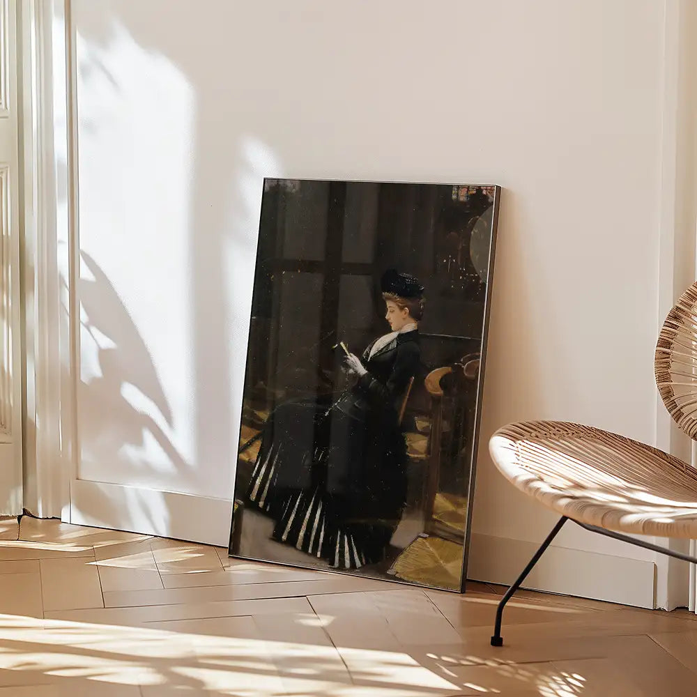 Painting of a woman in a black dress reading in an elegant setting, propped against a wall beside a stylish chair.