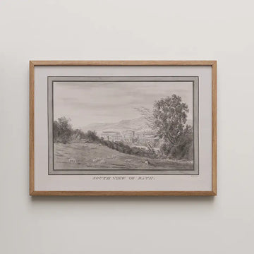 Framed black and white illustration titled "South View of Bath," depicting a serene landscape with trees and grazing sheep.